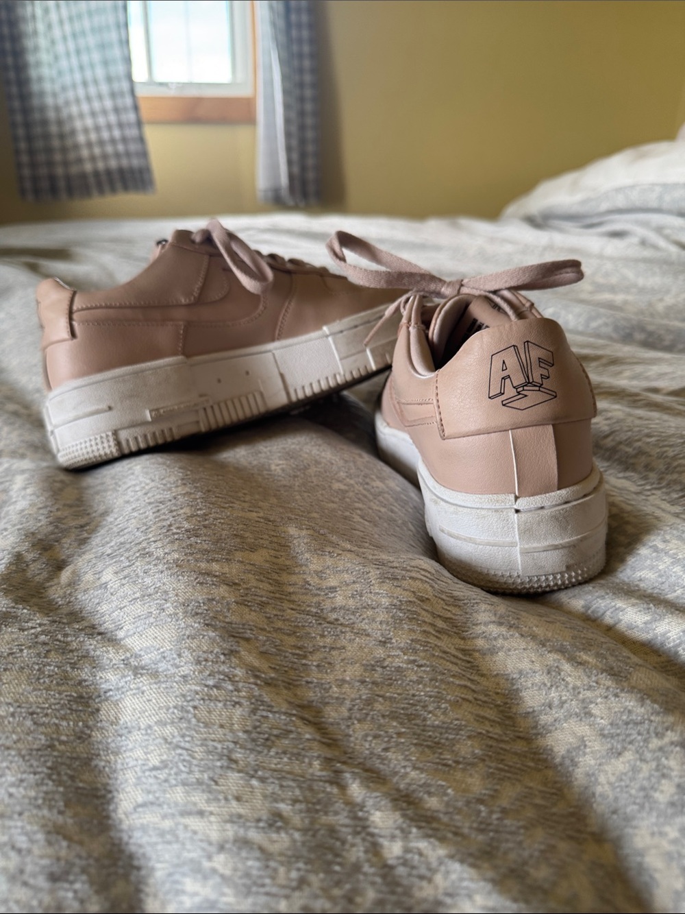 Women’s AF Nike Low-Top Sneakers in Blush Pink and White